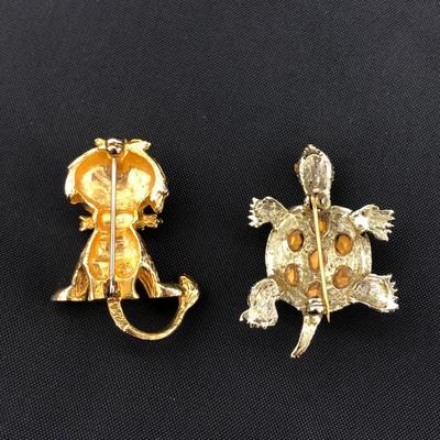 .177. Figural Brooches