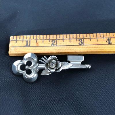 .177. Figural Brooches