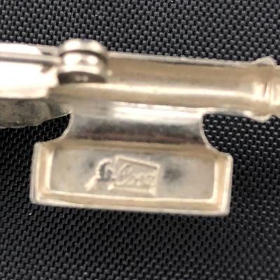 .177. Figural Brooches