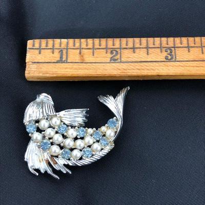 .177. Figural Brooches