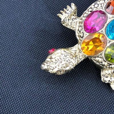 .177. Figural Brooches