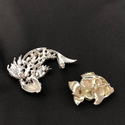 .177. Figural Brooches