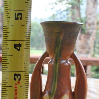 Lot #15: Pair of ROSEVILLEâ„¢ Candle Holders (one shows damage)