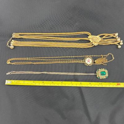 .187. Gold Tone Necklaces