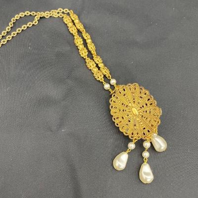 .190. Marked and Unmarked Gold Tone Necklaces