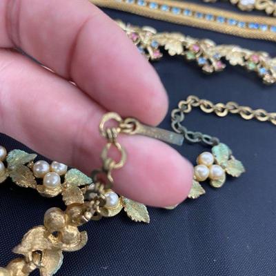 .190. Marked and Unmarked Gold Tone Necklaces