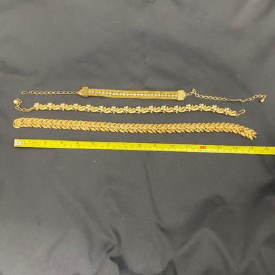 .190. Marked and Unmarked Gold Tone Necklaces