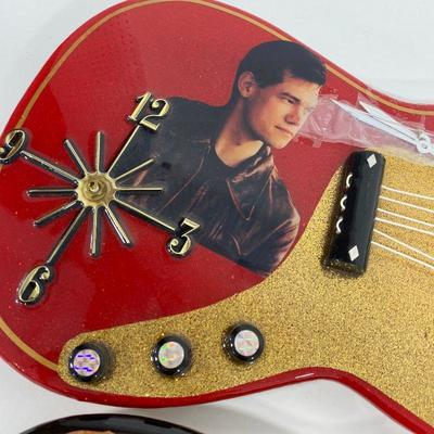 .203. Two Guitar Clocks