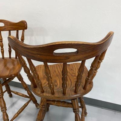 .204. Two Swivel Bar Stools