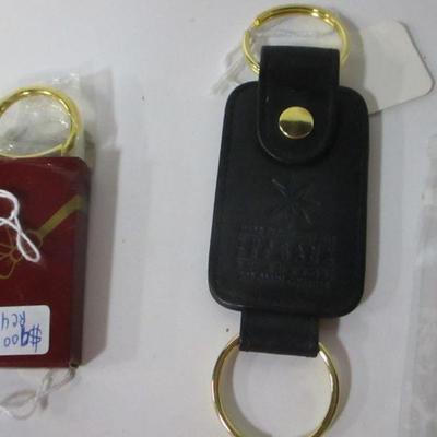 Lot 106 - Key Chains & Watches & Bands