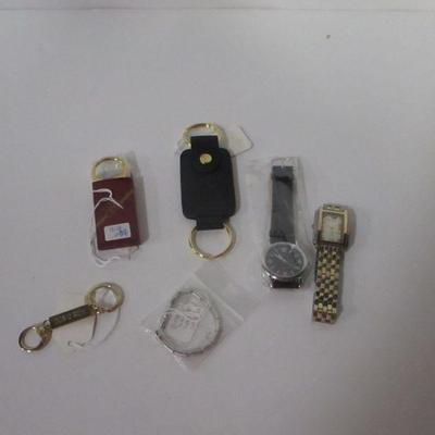 Lot 106 - Key Chains & Watches & Bands