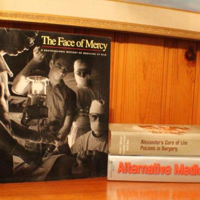 Lot #259: (3) Large Hardback Books (featuring THE FACE OF MERCY)