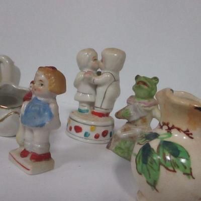 Lot 110 - Porcelain Figurines 