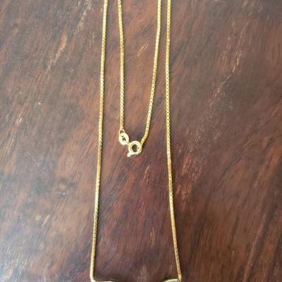 Lot 288: 14k Yellow Gold 17" Necklace with a Diamond 