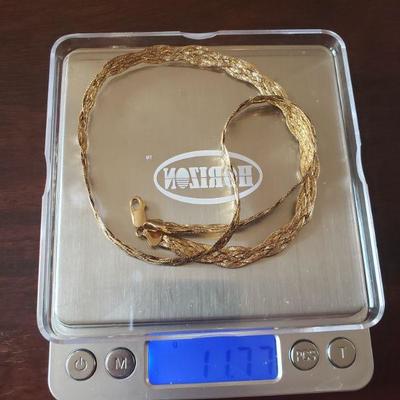 Lot 292: 14k Yellow Gold Braided 18" Necklace 