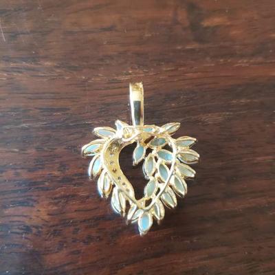 Lot 295: 14k Yellow Gold and Opal Heart Pendant 