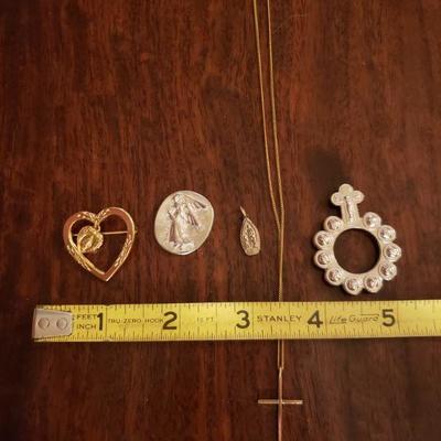 Lot 303: Vintage Gold Fill Cross Necklace,  Virginia Mary Brooch and Pendant Lot