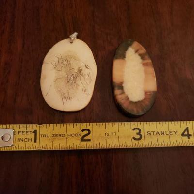Lot 311: (2) Horn Pendants
