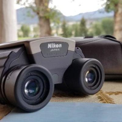 Lot #348: NIKON 8 x 25 Binoculars w/ Soft Case