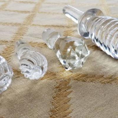 Lot #353: Group of (4) Assorted Glass Wine Stoppers