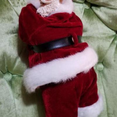 Lot #410; Vintage Santa Claus putting on gloves Christmas Figure