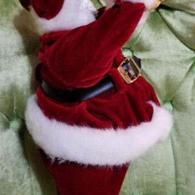 Lot #410; Vintage Santa Claus putting on gloves Christmas Figure