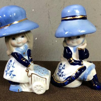 #101 Figurines of Little Girls with Big hats.
