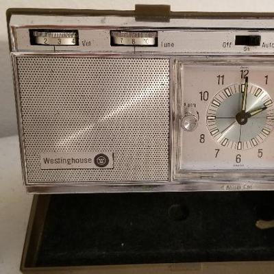 Lot #132  Pair of vintage 1960's Radio/Alarm Clocks - one marked "Mardi Gras 1966 - WORKS!