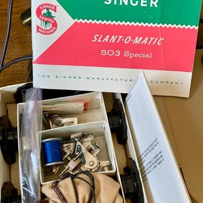 #215   SINGER SLANT O MATIC PORTABLE SEWING MACHINE W/CASE & ATTACHMENTS