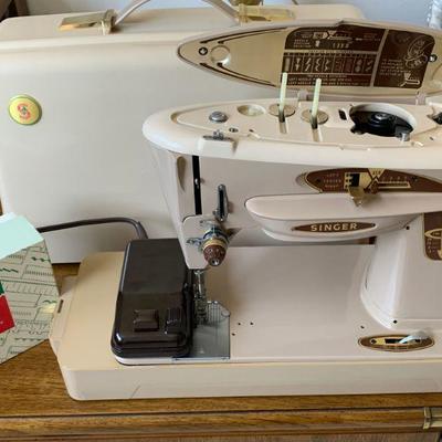 #215   SINGER SLANT O MATIC PORTABLE SEWING MACHINE W/CASE & ATTACHMENTS