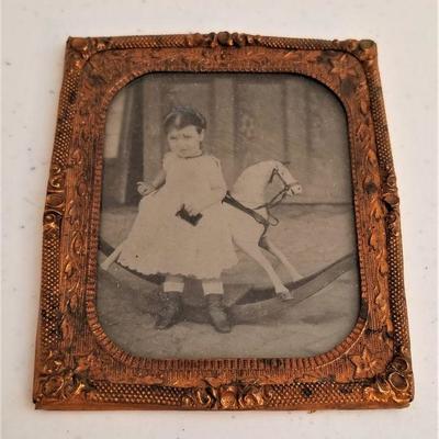 Lot #137  19th Century Ambrotype of a Child with a Rocking Horse
