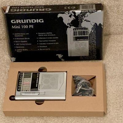 #224   GRUNDIG MINI 100 PE AM/FM STEREO WORLD RADIO 
