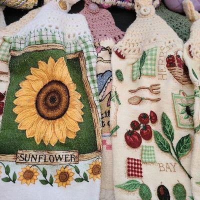 K87: Decorative Dish Towels, Pot Holders and One Mitts.