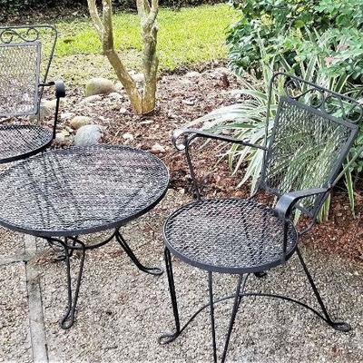 Lot #164  Child's Cast Iron Patio set - table/2 chairs