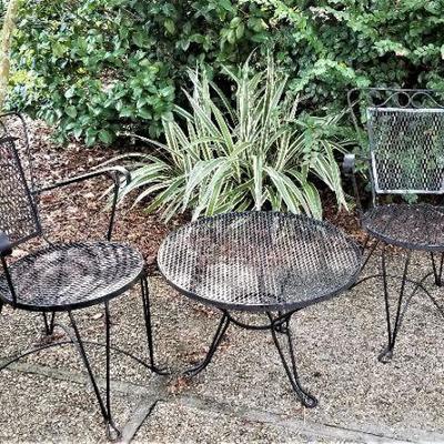 Lot #164  Child's Cast Iron Patio set - table/2 chairs