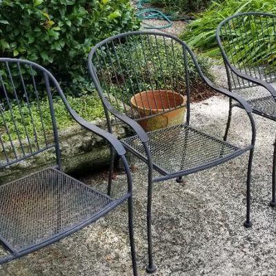 Lot #167  Lot of Three matching cast iron patio chairs