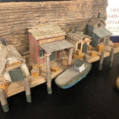 F31: Brass Hooks and Wood Carved Dock Art