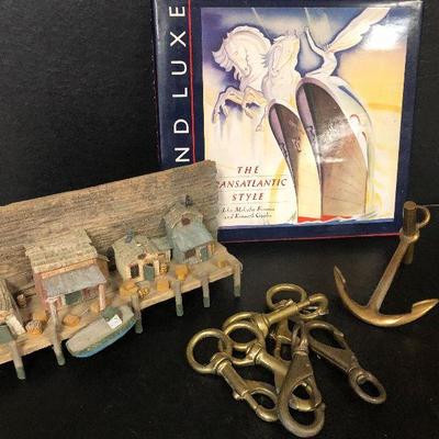 F31: Brass Hooks and Wood Carved Dock Art