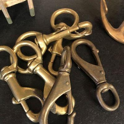 F31: Brass Hooks and Wood Carved Dock Art