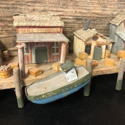 F31: Brass Hooks and Wood Carved Dock Art