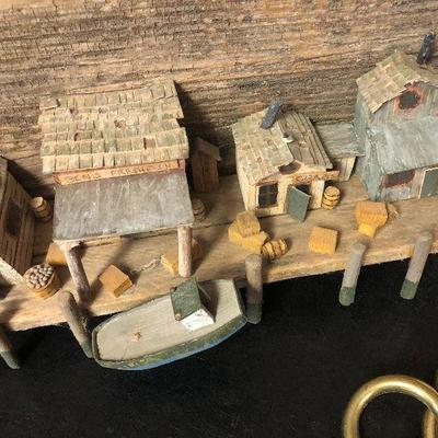 F31: Brass Hooks and Wood Carved Dock Art