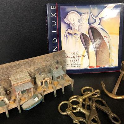 F31: Brass Hooks and Wood Carved Dock Art