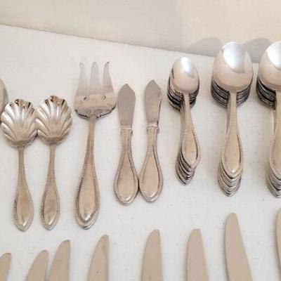 Lot #179  Set of Oneida Stainless Flatware  - 64 pieces