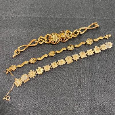 1.84. Seventeen Gold-Tone Bracelets