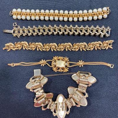 1.84. Seventeen Gold-Tone Bracelets