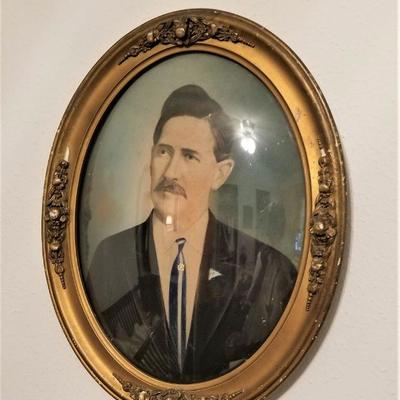 Lot #190  Pair of Vintage Photographs in Antique Curved Glass Frames
