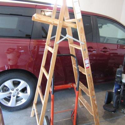 LOT 67  WERNER LADDER AND DOLLY
