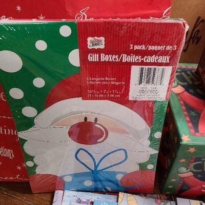 C240: Huge Lot of Christmas Wrap, Boxes, Bags and Tags!