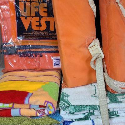 C50: Life Vests and Beach Towel Lot