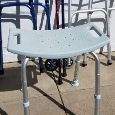 Lot 2-295: Bundle of Walkers, Canes and Shower Seat